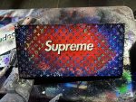 Supreme Logo Text Stencil-painted bold word logo on canvas with matte paint texture