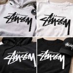 Stussy-style logo stencil painted on streetwear clothing—black on light fabric and white on black fabric.