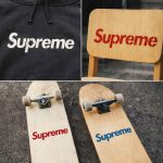 Supreme Logo Text Stencil-painted bold word logo on canvas with matte paint texture